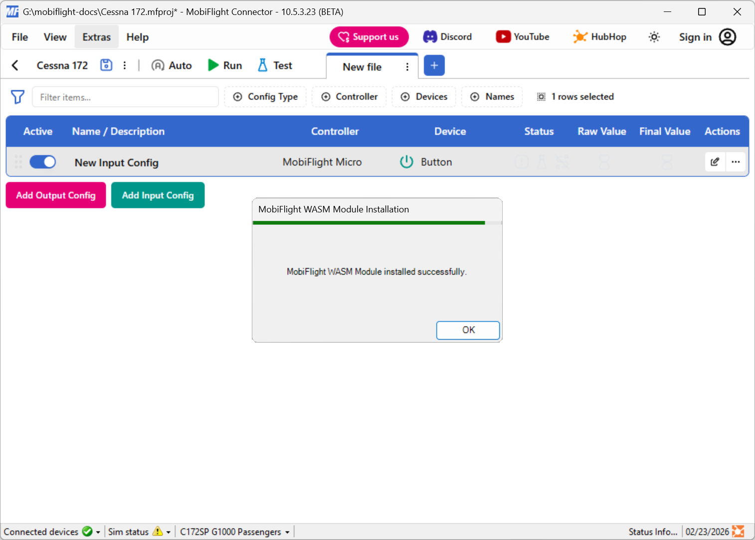 Screenshot of the main MobiFlight window with a dialog showing a successful WASM installation.